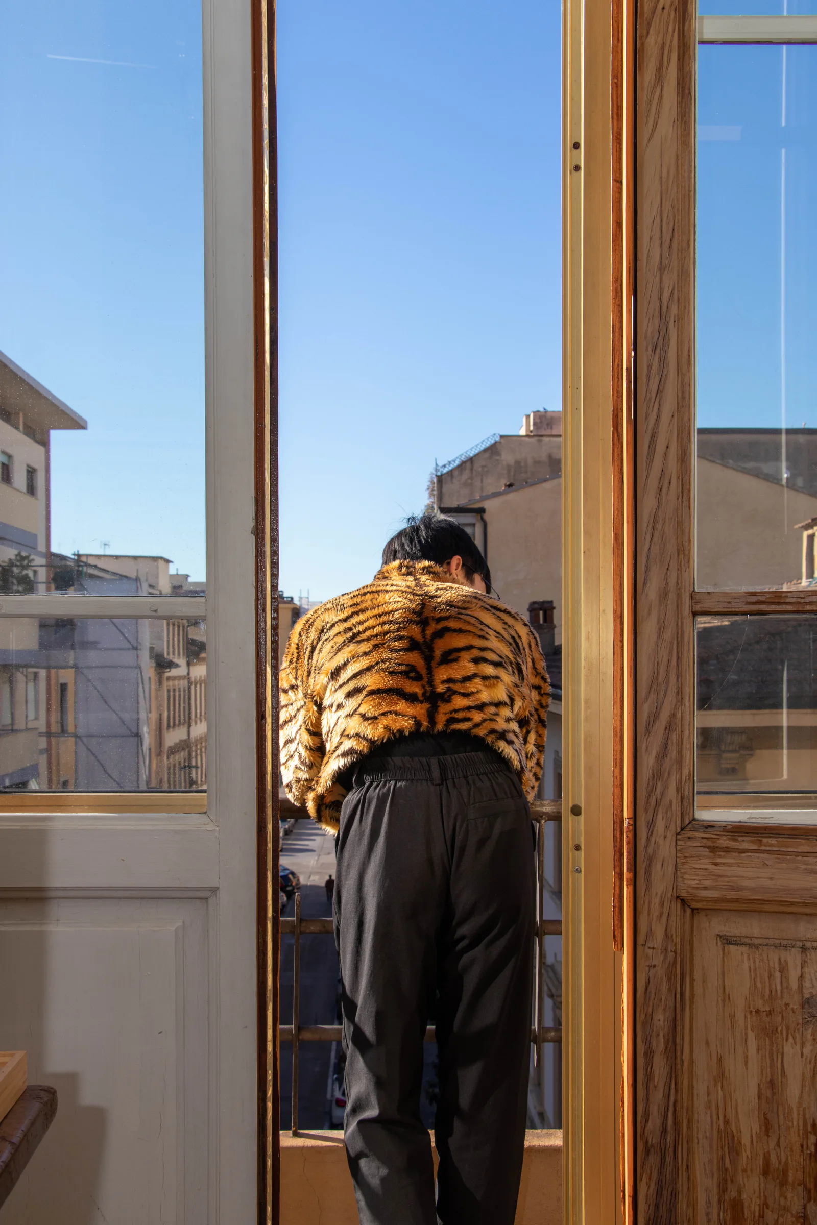 A person appearing tired in a living space